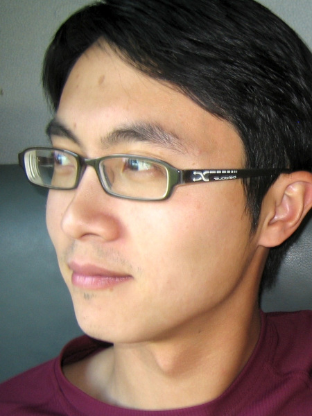 A headshot of nature writer Isaac Yuen.